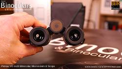 Holding the Compact Pentax VD 4x20 Binoculars, Monocular & Spotting Scope